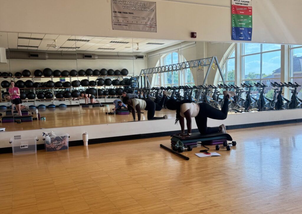 Mia christmon teaching a rec center group fitness class