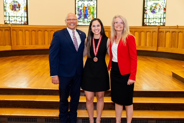 Bridget Stafford with the Crawford's receiving a 2026 President's Distinguished Service Award