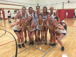 volleyball players posing together