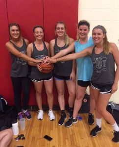 basketball players posing together