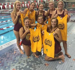 swimmers posing together