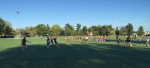 students playing football