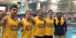 swimmers posing together