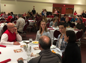 People sitting and chatting at a table