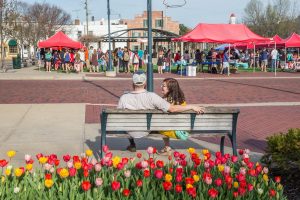 People hanging around at Farmers Market