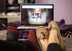 People watching shows on their laptop