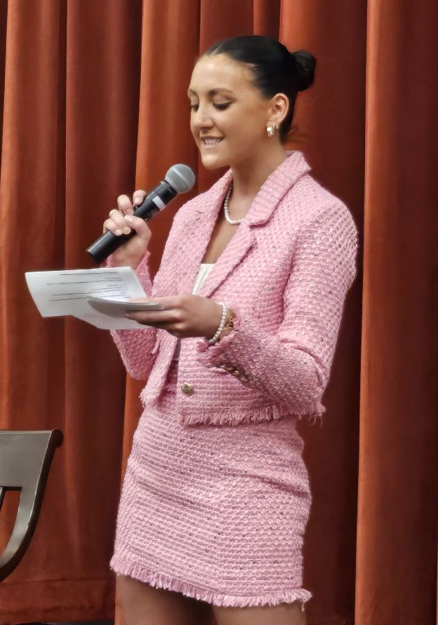 Photo of Madi Anderson introducing the speaker