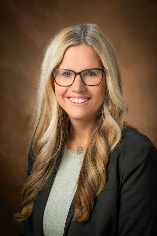 Headshot of a smiling Sara Potter