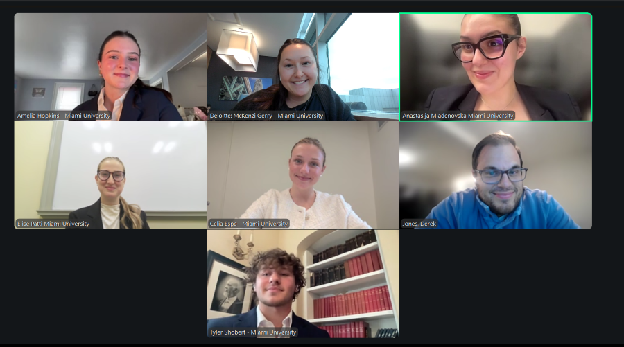 Screenshot of team members on a Zoom call with Derek Jones. 