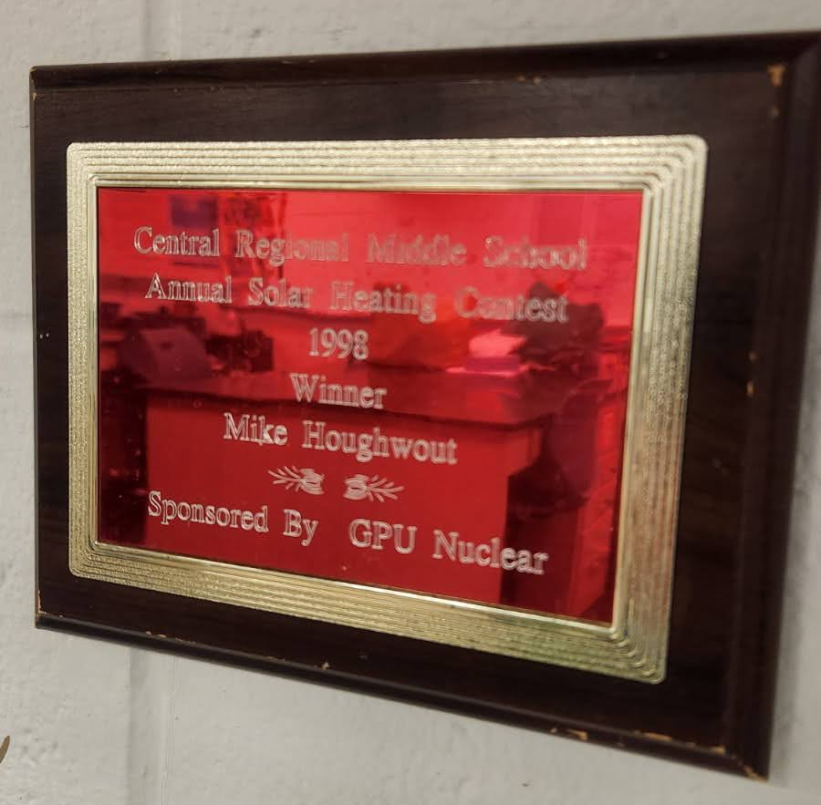 Mike’s solar oven winner plaque from middle school. He keeps this in the back of his classroom as a reminder of the importance of being a supportive teacher.