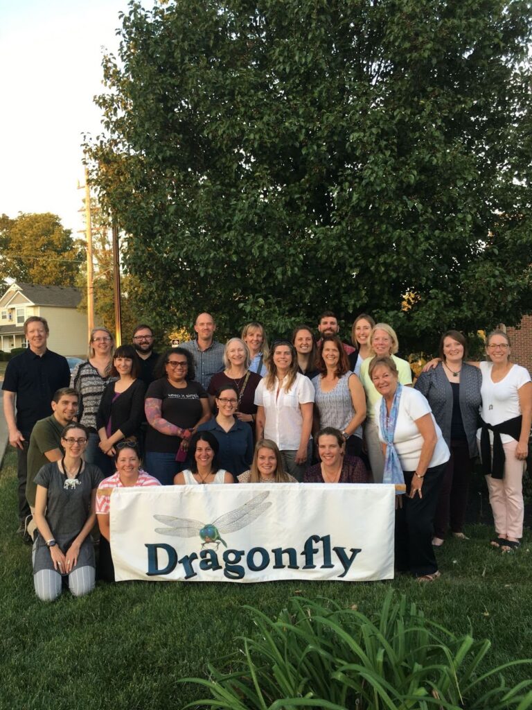 A group photo of the Project Dragonfly staff standing together outdoors on the Miami University campus in Oxford, Ohio.