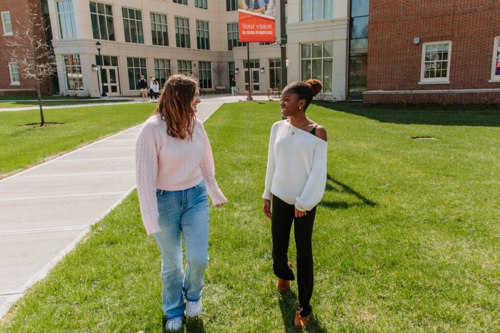 Digital Intern Natalie Pond collaborating on a social content shoot with Content Intern Terren Lewis.