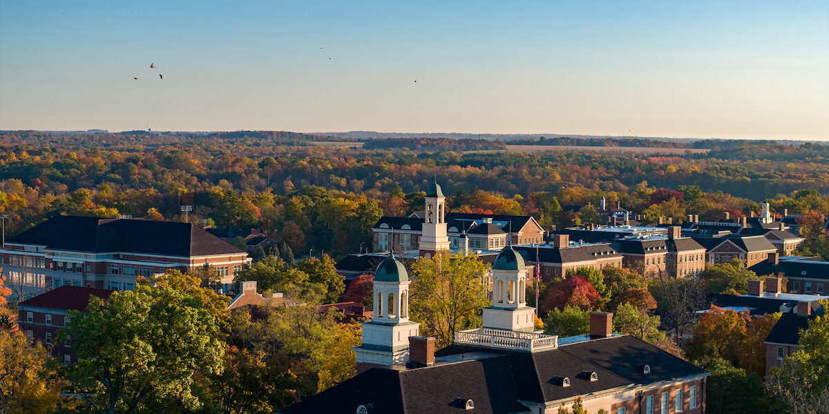an aerial view of campus on a clear fall day