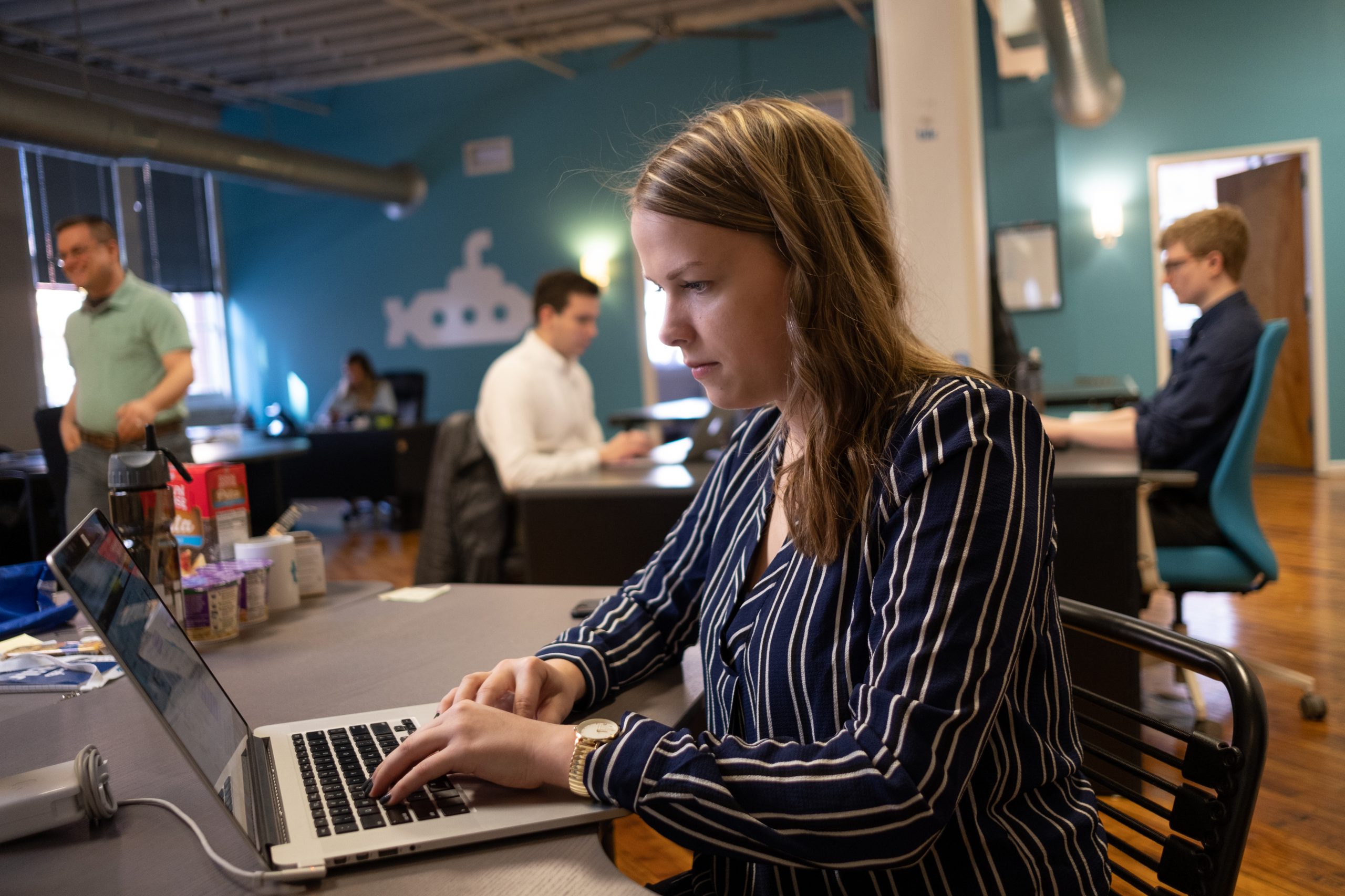 Woman uses laptop