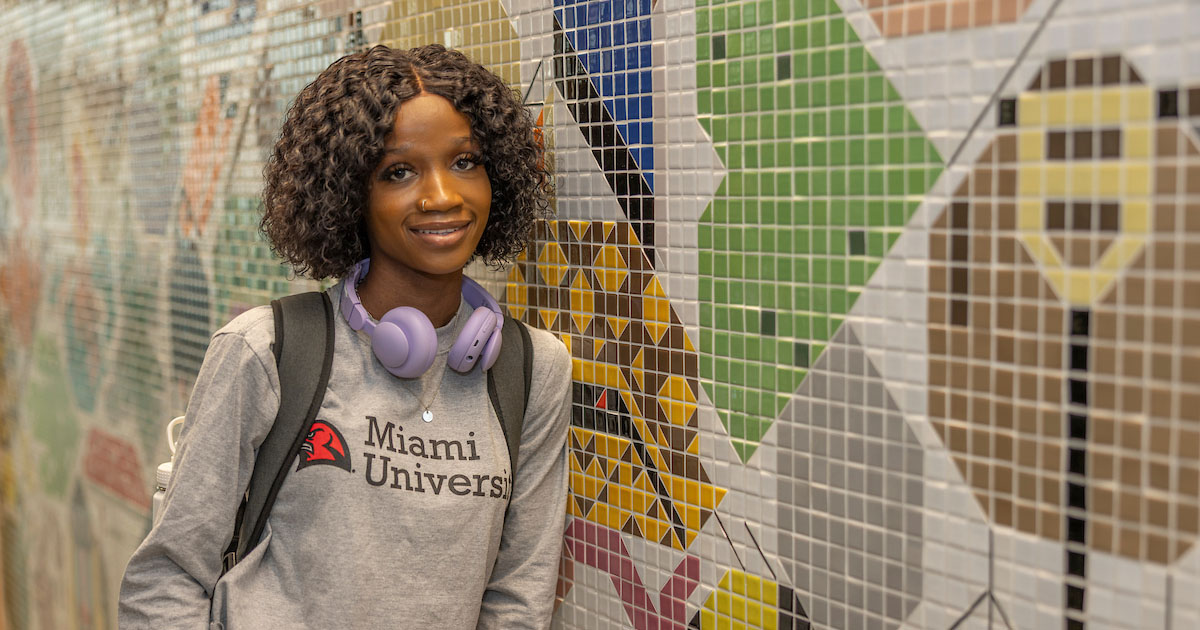 A Miami Online student who is smiling and confident