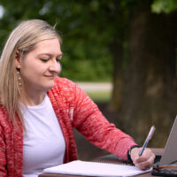 A student working on her online grant writing microcredential