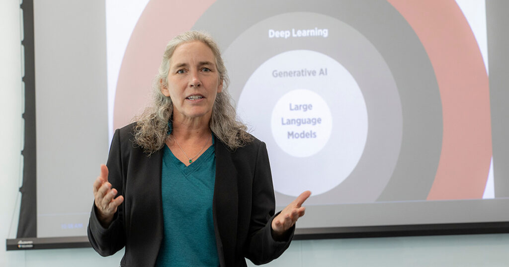 Dr. Heidi McKee presenting her research on AI and ethics.
