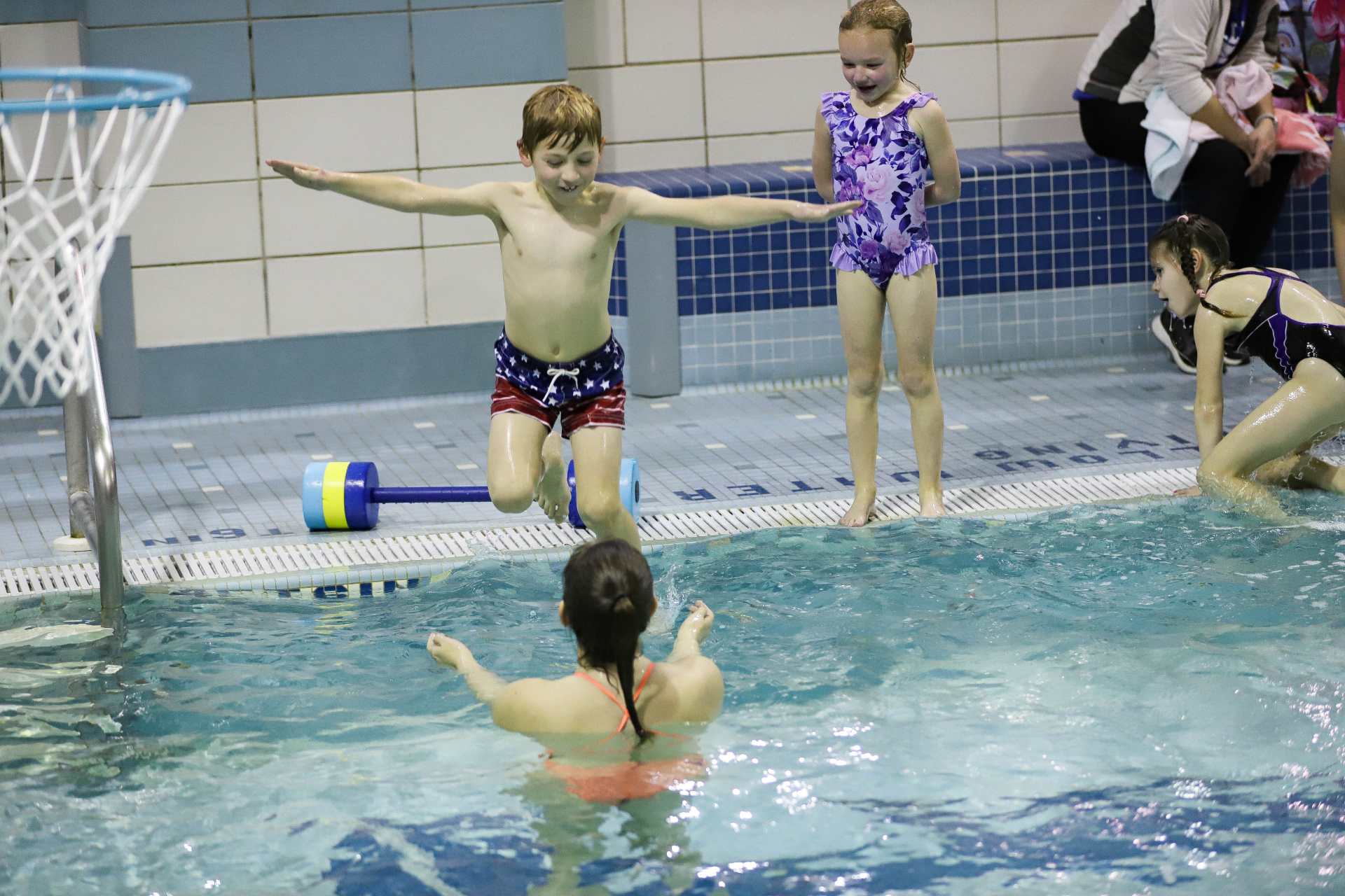 Marie teaching a learn to swim class