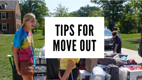 The text "Tips for Move out" in black against a white backdrop with a background of students moving their personal belongings on campus