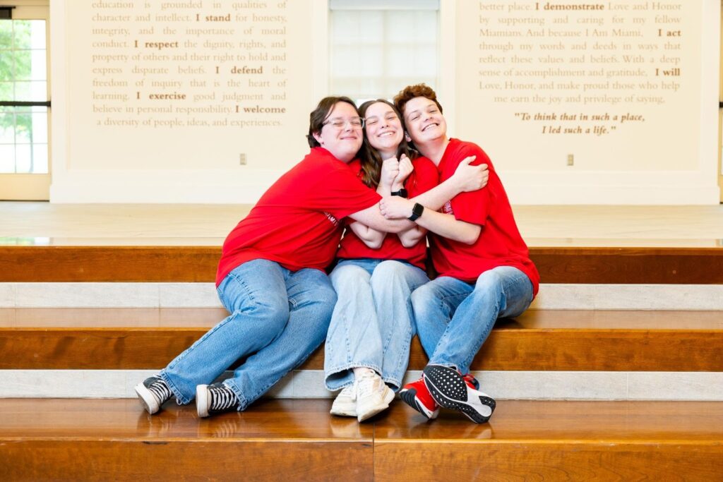 Students hugging in Armstrong