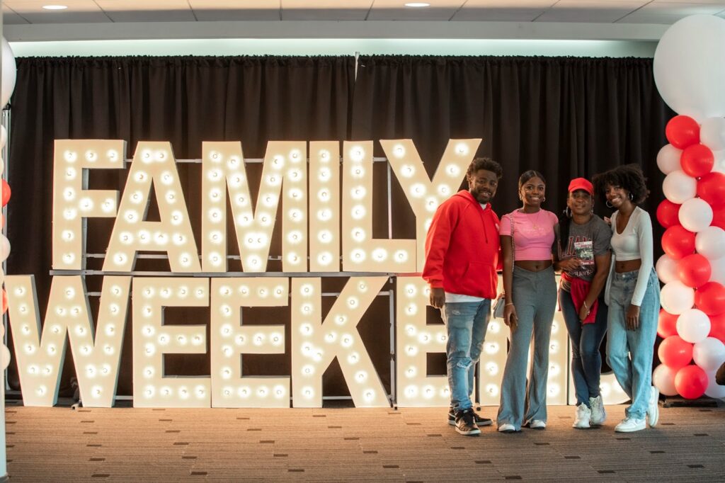 Students with their family at family weekend 