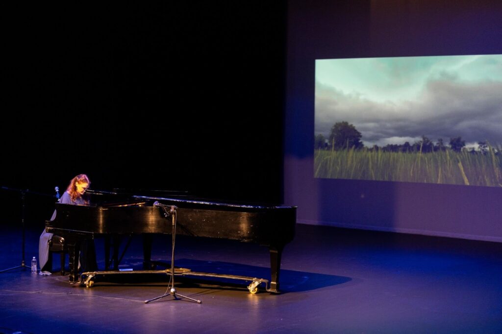 A woman playing panio