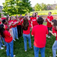 Students playing in a circle