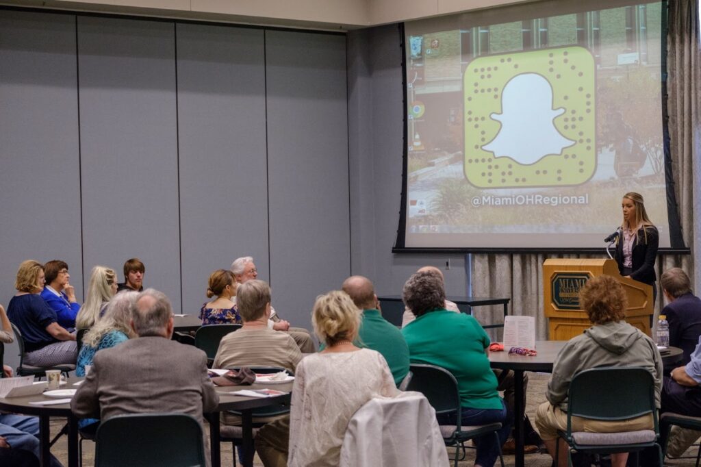 A woman giving a presentation 